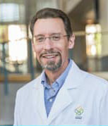 Dr. Chris Corless